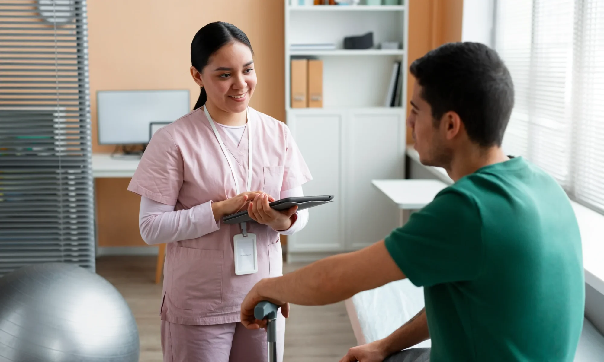 doctor-helping-patient-rehabilitation (1) (1)